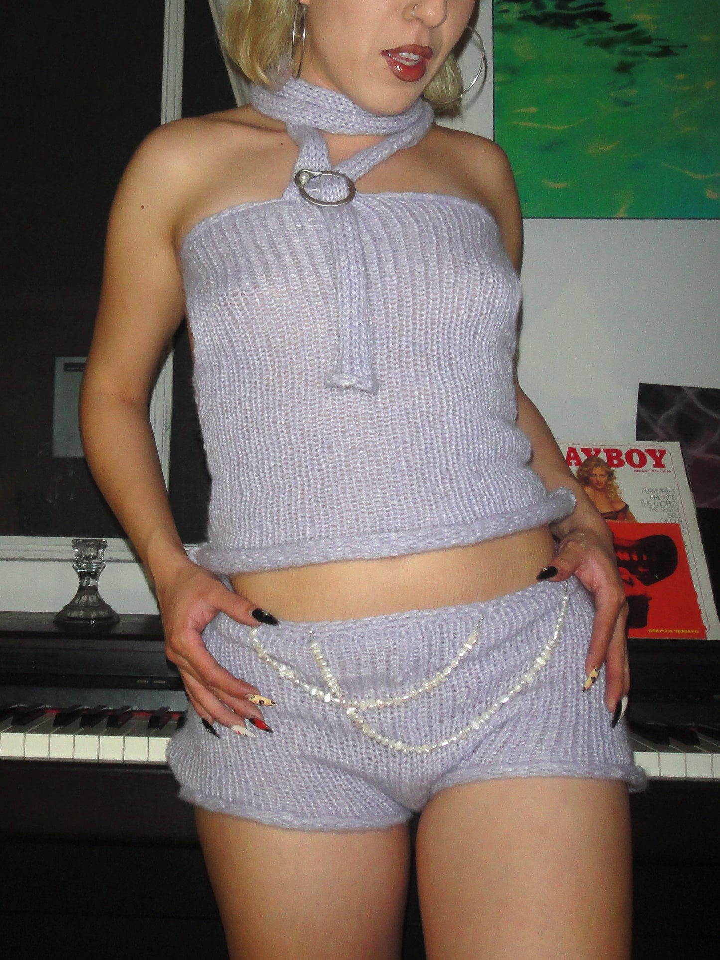 Model wearing Bailey Prado Lola Pearl String Shorts with real freshwater pearl strap details.