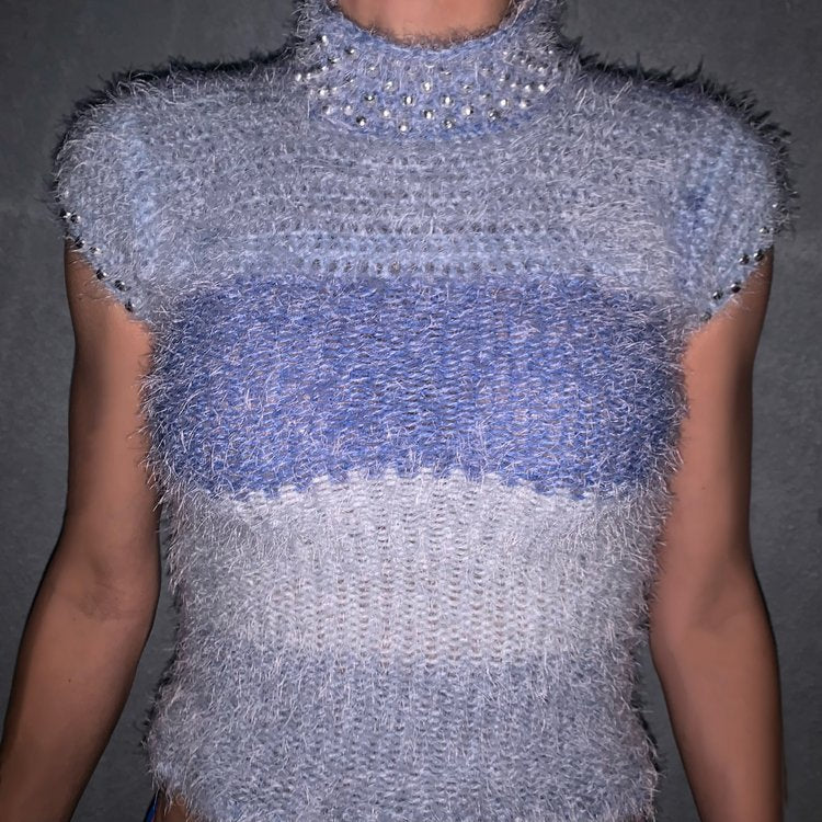 Model wearing the Bailey Prado Gradient Beaded Top, a blue ombré mohair knit top finished with silver bead trim and a lace-up back.