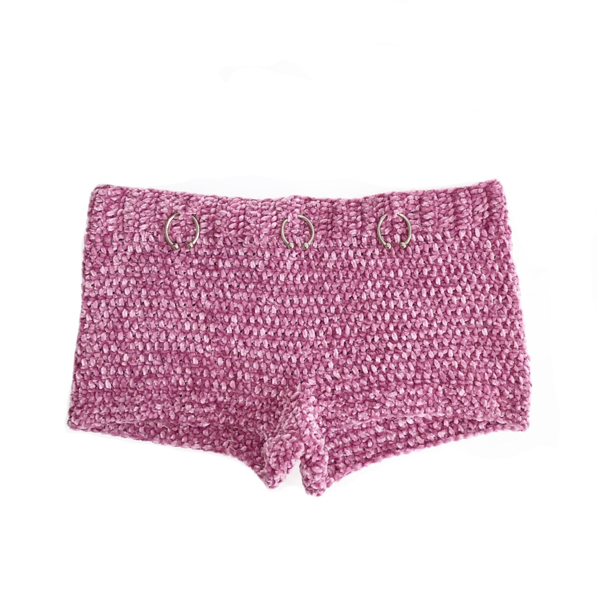 Hand-crocheted lilac shorts featuring silver horseshoe barbell hardware and an adjustable back button closure by Bailey Prado.