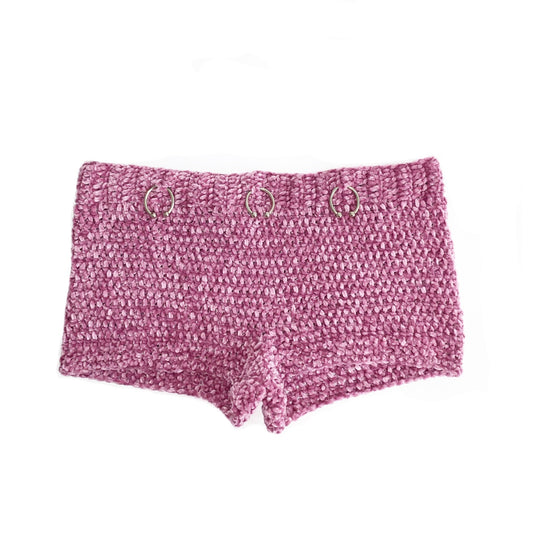 Hand-crocheted lilac shorts featuring silver horseshoe barbell hardware and an adjustable back button closure by Bailey Prado.