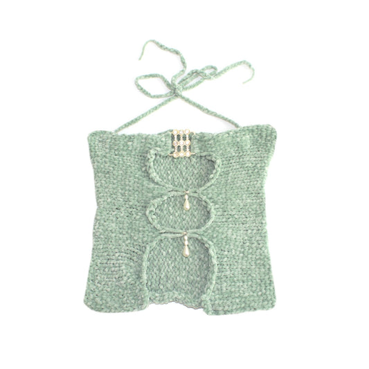 Bailey Prado Sea Green Velvet Top featuring a hand-crocheted sea green velvet halter top with a rhinestone buckle, pearl embellishments, and front cutout detailing.