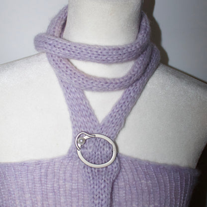 Close-up of the silver buckle detail and soft knit texture on the Bailey Prado Lola Buckle Tank.