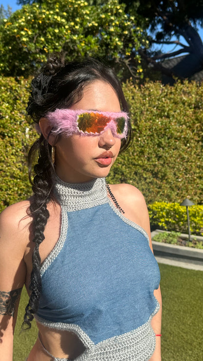Handmade knitted sunnies by Bailey Prado featuring UV400 protective lenses, available in red, black, pink, and blue.