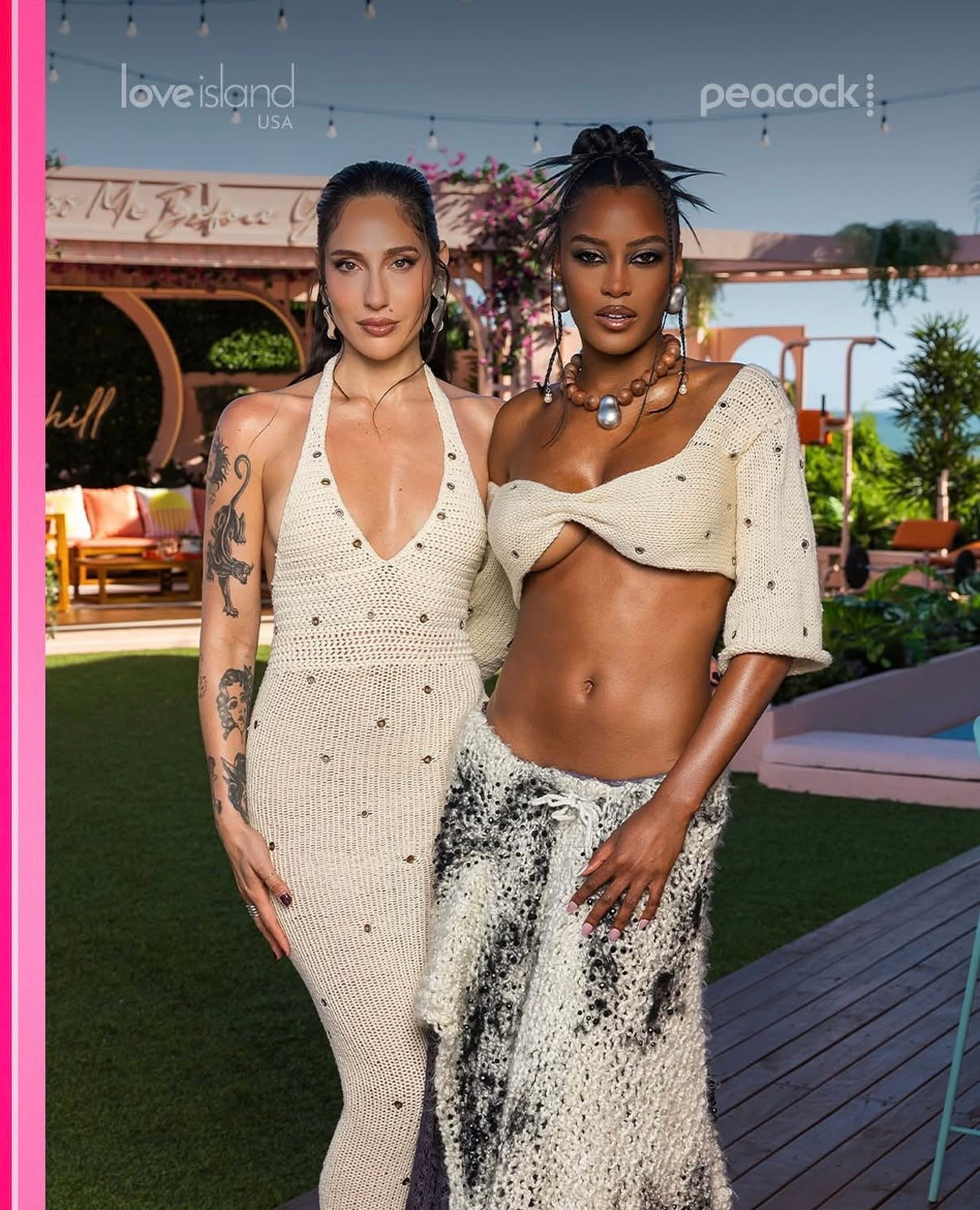 Two women posing together outdoors with 'Love Island USA' branding. Women's handmade cream knit bow top with sculptural sleeves and eyelet details.